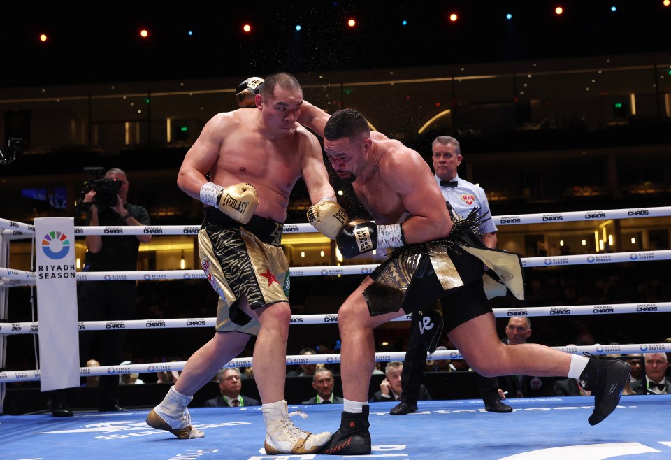 Zhang floored Parker twice in their dust-up, before losing on points