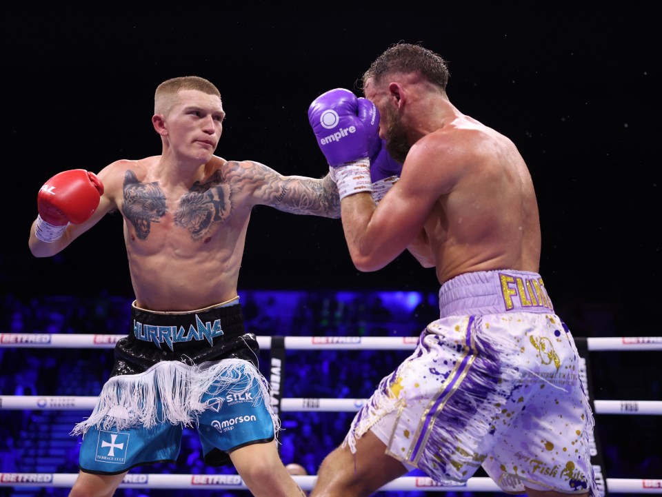 Hatton (left) was outpointed by Flint in Sheffield on Saturday night