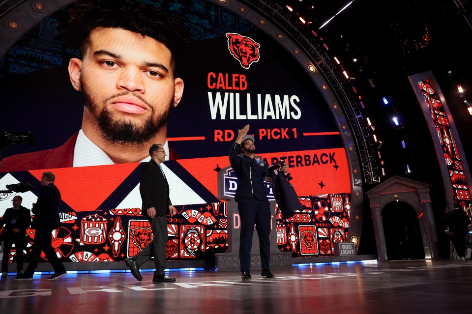 DETROIT, MICHIGAN - APRIL 25: Caleb Williams celebrates after being selected first overall by the Chicago Bears during the first round of the 2024 NFL Draft at Campus Martius Park and Hart Plaza on April 25, 2024 in Detroit, Michigan. (Photo by Gregory Shamus/Getty Images)