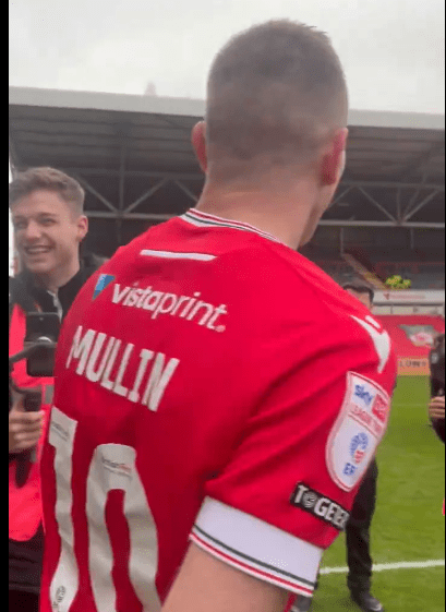 Mullin limped off after celebrating with the Wrexham fans