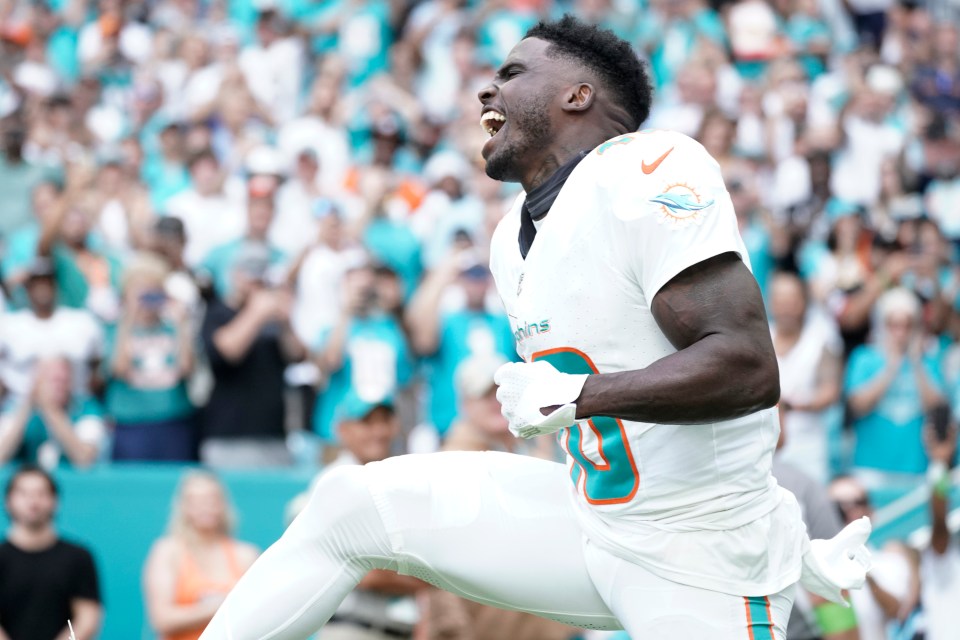 MIAMI GARDENS, FLORIDA - NOVEMBER 19: Tyreek Hill #10 of the Miami Dolphins runs onto the field during team introductions prior to the game against the Las Vegas Raiders at Hard Rock Stadium on November 19, 2023 in Miami Gardens, Florida. (Photo by Bryan Cereijo/Getty Images)
