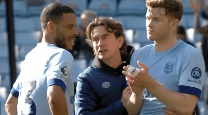 Brentford boss Frank eventually stepped in where he put his arm around Collins