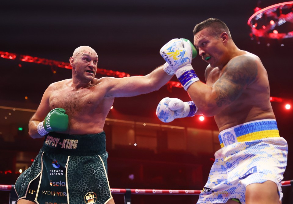 RIYADH, SAUDI ARABIA - MAY 18: Tyson Fury punches Oleksandr Usyk during the IBF, WBA, WBC, WBO and Undisputed Heavyweight titles' fight between Tyson Fury and Oleksandr Usyk at Kingdom Arena on May 18, 2024 in Riyadh, Saudi Arabia. (Photo by Richard Pelham/Getty Images)