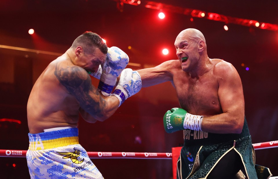RIYADH, SAUDI ARABIA - MAY 18: Tyson Fury punches Oleksandr Usyk during the IBF, WBA, WBC, WBO and Undisputed Heavyweight titles' fight between Tyson Fury and Oleksandr Usyk at Kingdom Arena on May 18, 2024 in Riyadh, Saudi Arabia. (Photo by Richard Pelham/Getty Images)