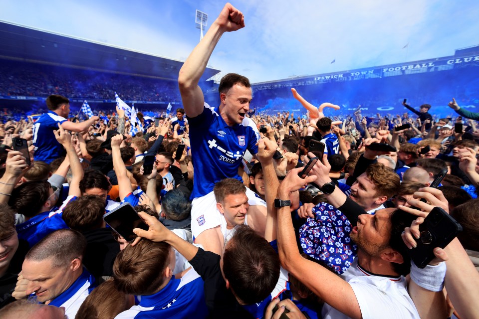 Fans invaded the pitch as soon as their Premier League status was confirmed
