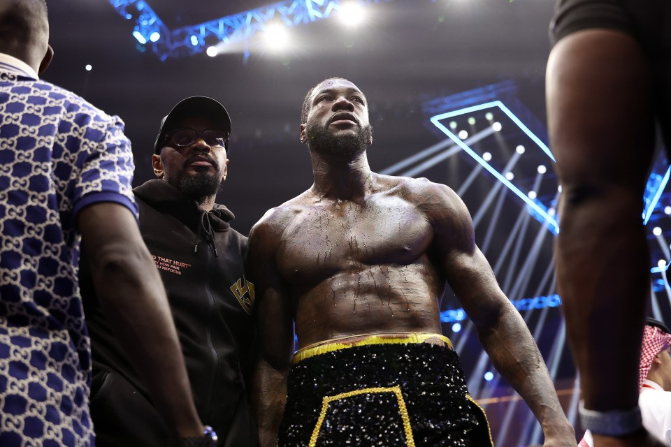 RIYADH, SAUDI ARABIA - JUNE 01: Deontay Wilder of Team Matchroom looks on after being knocked down by Zhilei Zhang of Team Queensberry during the Heavyweight fight between Deontay Wilder of Team Matchroom and Zhilei Zhang of Team Queensberry on the 5v5: Queensberry v Matchroom Fight Night card at Kingdom Arena on June 01, 2024 in Riyadh, Saudi Arabia. (Photo by Richard Pelham/Getty Images)