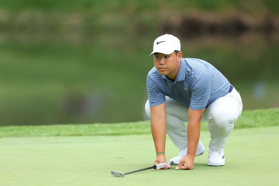 DUBLIN, OHIO - JUNE 06: Tom Kim of South Korea putts on the third green during the first round of the Memorial Tournament presented by Workday at Muirfield Village Golf Club on June 06, 2024 in Dublin, Ohio. (Photo by Michael Reaves/Getty Images)