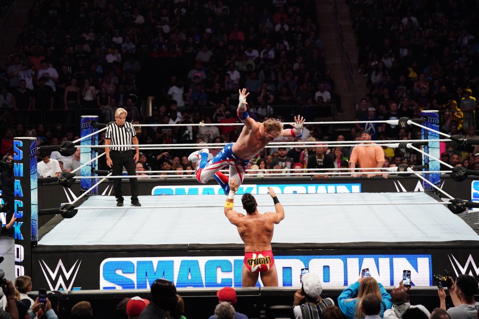 NEW YORK, NEW YORK - JUNE 28: WWE United States Champion goes over the top rope to land on LA knight during WWE SmackDown at Madison Square Garden on June 28, 2024 in New York City.  (Photo by WWE/Getty Images)