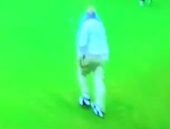 He whacked his backward-rolling ball with his putter and kept walking forward