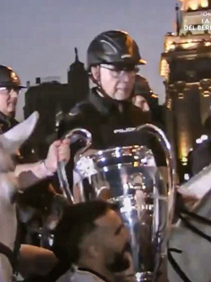 He even posed with the iconic trophy with his son while on horseback