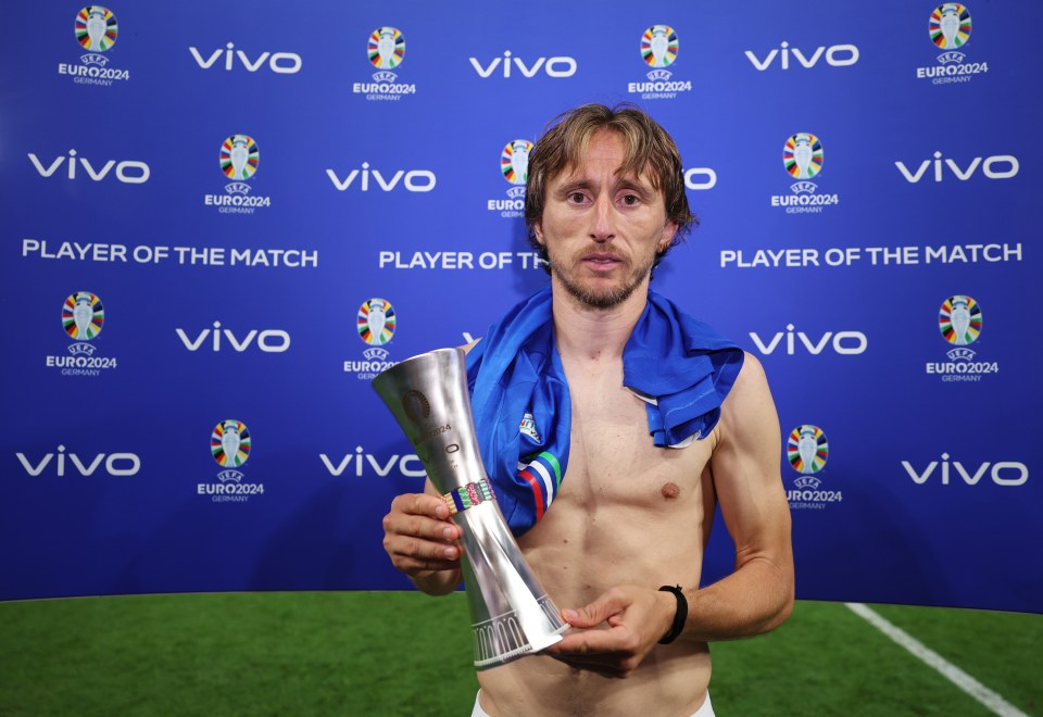 He looked visibly disappointed as he picked up his man of the match award following the 1-1 draw