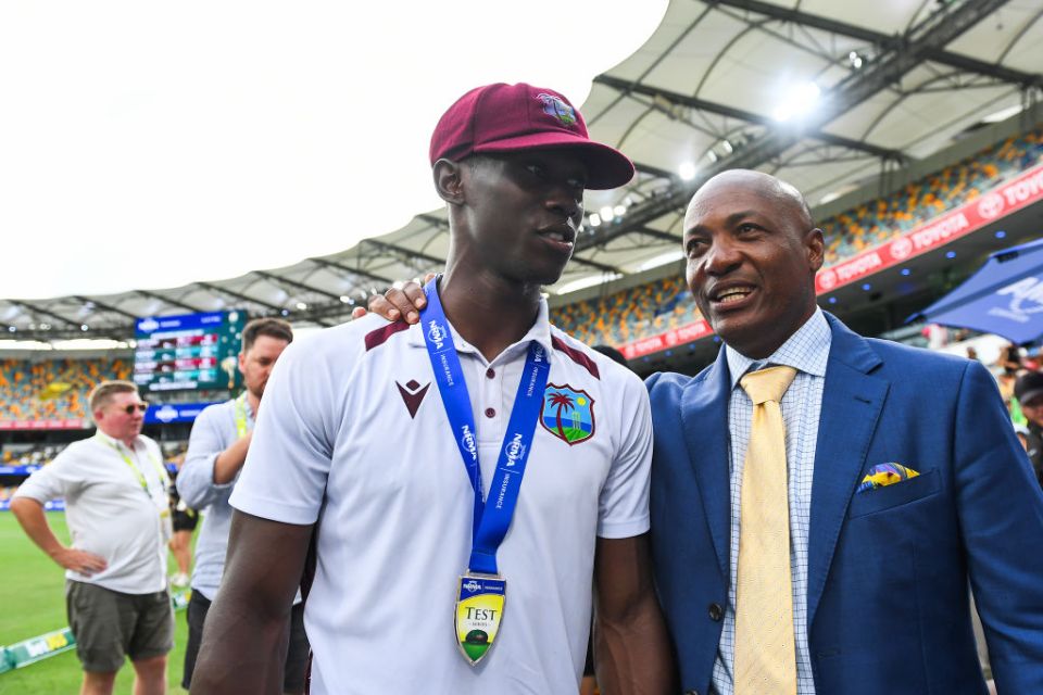 BRISBANE, AUSTRALIA - JANUARY 28: Shamar Joseph of West Indies is congratulated by Brian Lara during day four of the Second Test match in the series between Australia and West Indies at The Gabba on January 28, 2024 in Brisbane, Australia. (Photo by Albert Perez - CA/Cricket Australia via Getty Images)