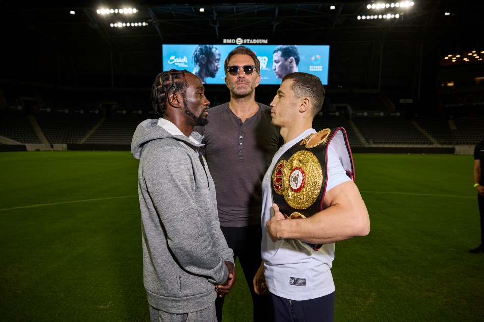 LOS ANGELES, CALIFORNIA - JULY 28: Terence Crawford and Israil Madrimov Face Off at the BMO Stadium with Eddie Hearn Chairman of the Matchroom ahead of their WBA World Interim and WBO World Super Welterweight Title fight on saturday night on July 28, 2024 in Los Angeles, California. (Photo by Mark Robinson/Matchroom Boxing/Getty Images)