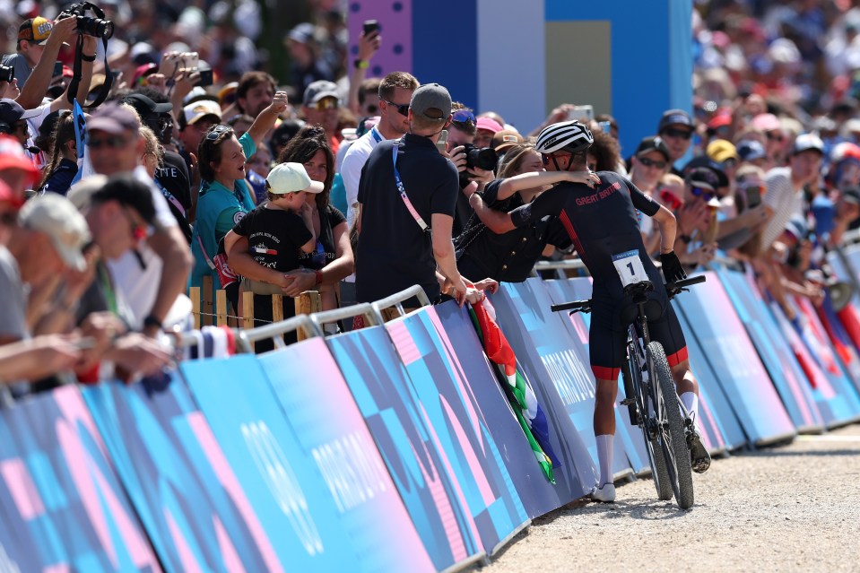 Pidcock went straight to his family after racing past the finish line in emotional scenes