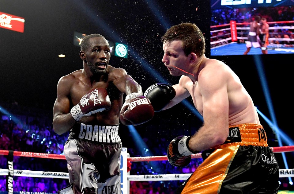 LAS VEGAS, NV - JUNE 09: Terence Crawford lands a punch on Jeff Horn in the 9th round during their WBO welterweight title at MGM Grand Garden Arena on June 9, 2018 in Las Vegas, Nevada.  (Photo by Bradley Kanaris/Getty Images)
