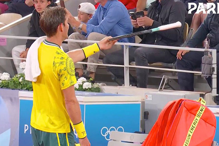 Ebden offered his racket out to a fan in the stands during his demolition