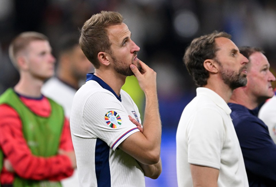Kane could only watch as Spain collected their trophy
