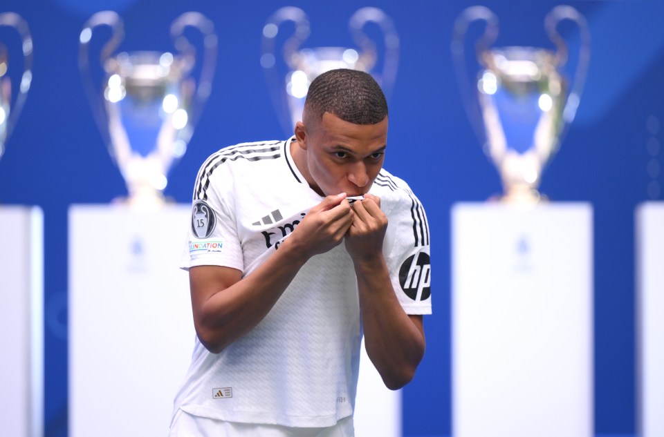 Mbappe kissed the badge whilst standing on stage at the Santiago Bernabeu