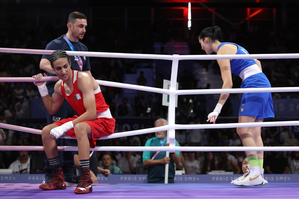 PARIS, FRANCE - AUGUST 01: Imane Khelif of Team Algeria looks as Angela Carini of Team Italy leaves the ring after abandoning their Women's 66kg preliminary round match in the first round on day six of the Olympic Games Paris 2024 at North Paris Arena on August 01, 2024 in Paris, France. (Photo by Richard Pelham/Getty Images)