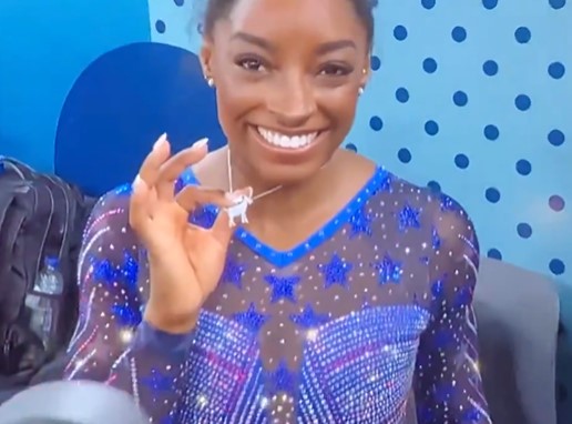 Biles knows she's the GOAT and even wore a necklace with a goat pendant