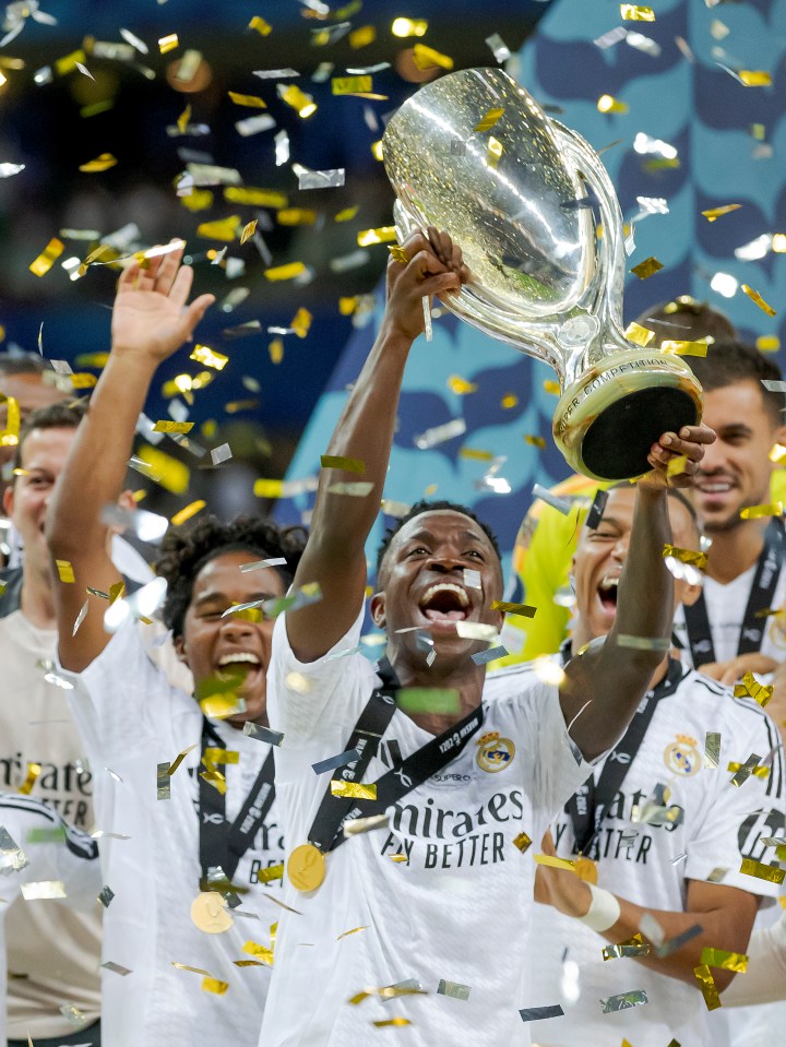 Vinicius celebrating Real Madrid' second UEFA Super Cup in 2024.
