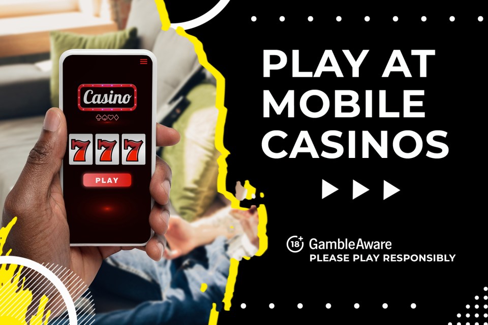 Hand holding phone displaying a mobile casino slot game with 777 showing.  Play at mobile casinos.  Please play responsibly.