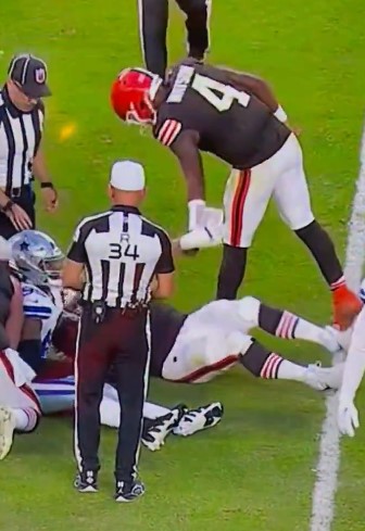 The offensive lineman appeared to push away Watson's hand and refuse his help