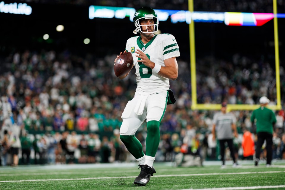 Aaron Rodgers #8 of the New York Jets warming up before a game.