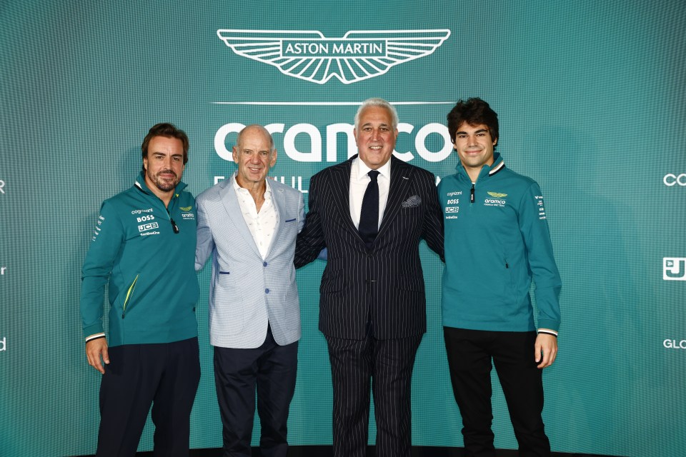 Lawrence Stroll (second right) is making waves in F1 alongside his son Lance (right)