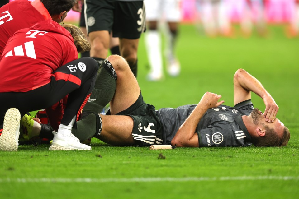 Kane received treatment before hobbling off in the 86th minute