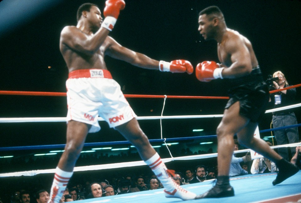 ATLANTIC CITY, NJ - JANUARY 22: Larry Holmes and Mike Tyson fights for the WBA, WBC and IBF heavyweight tittle on January 22, 1988 at the Convention Hall in Atlantic City, New Jersey. Tyson won the fight with a TKO in the 4th round. (Photo by Focus on Sport/Getty Images)