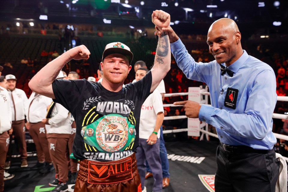 Canelo Alvarez celebrating a boxing victory.