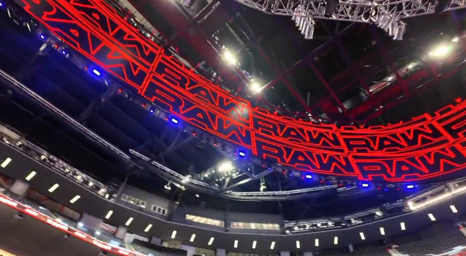 Raw's branding can be seen on the massive screens