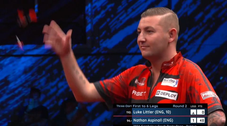 Nathan Aspinall jokingly threw his darts to the floor after he was beaten by Luke Littler