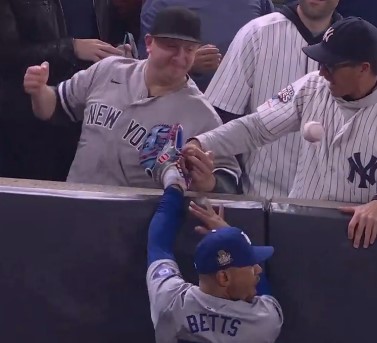 The fans ripped the ball out of his glove