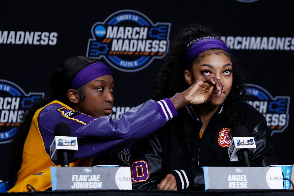 Johnson consoled teammate Reece after the Tigers crashed out of the NCAA Tournament at the Elite Eight stage last year