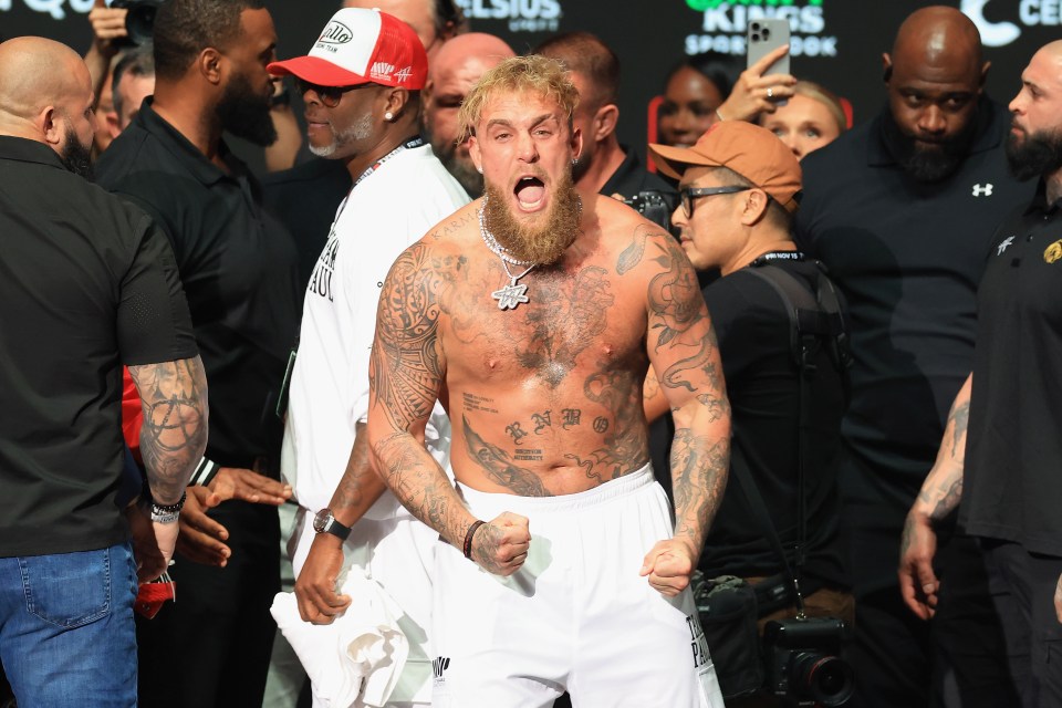 IRVING, TEXAS - NOVEMBER 14: Jake Paul reacts during the ceremonial weigh-in with Mike Tyson (not pictured) at The Pavilion at Toyota Music Factory on November 14, 2024 in Irving, Texas. The two are scheduled to meet in a heavyweight bout on November 15 at AT&T Stadium in Arlington, Texas. (Photo by Christian Petersen/Getty Images)