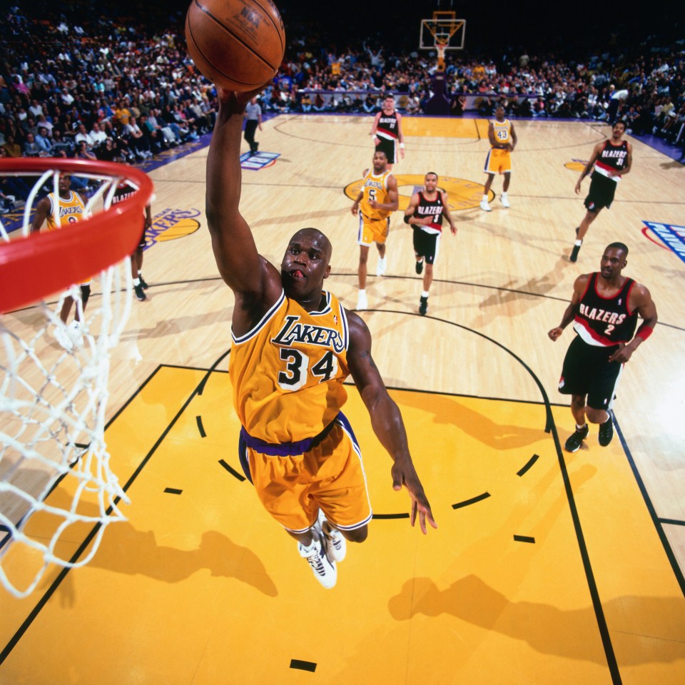 Shaquille O'Neal dunking during a Lakers vs. Blazers game.
