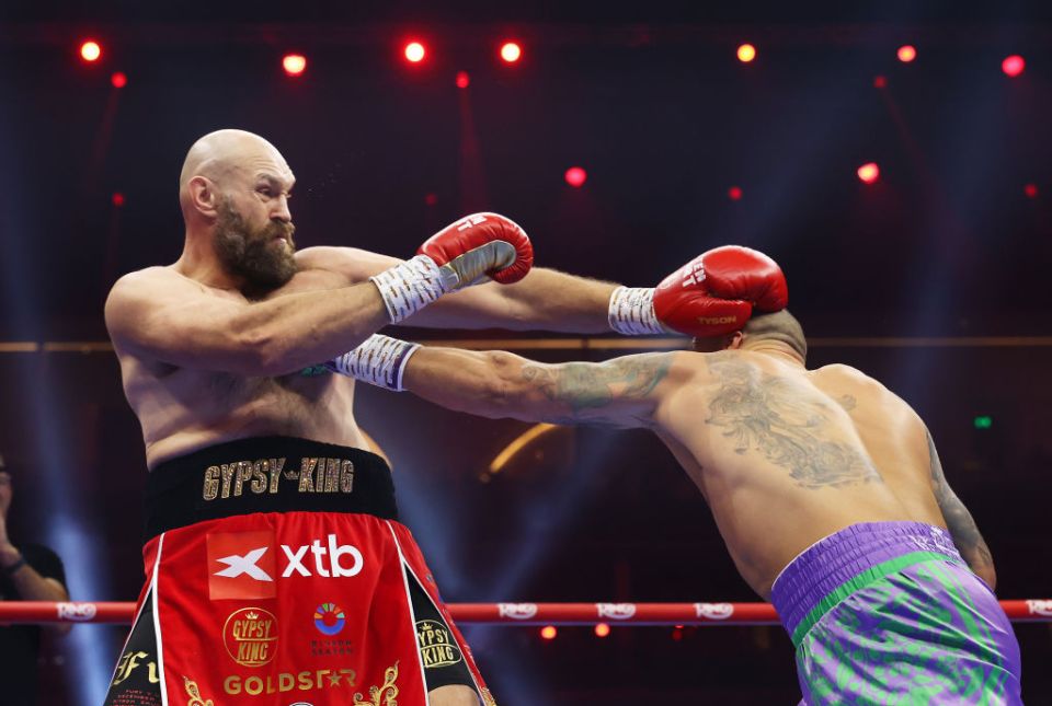 RIYADH, SAUDI ARABIA - DECEMBER 21: Oleksandr Usyk punches Tyson Fury during the IBF, IBO, WBA, WBC and WBO Undisputed World Heavyweight titles' fight between Oleksandr Usyk and Tyson Fury as part of Oleksandr Usyk v Tyson Fury 2, Reignited card at Kingdom Arena on December 21, 2024 in Riyadh, Saudi Arabia. (Photo by Richard Pelham/Getty Images)