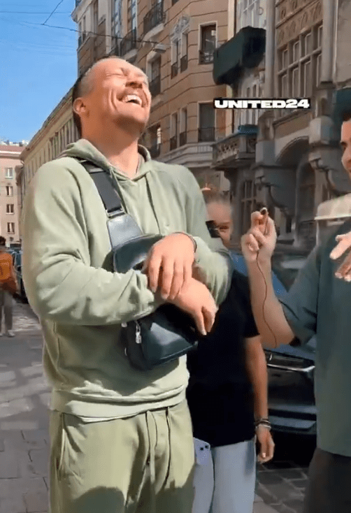 Usyk laughed as he showed off his fake Rolex