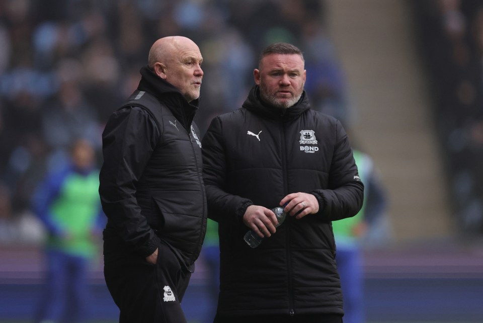 Rooney and assistant Mike Phelan will both leave the club with immediate effect