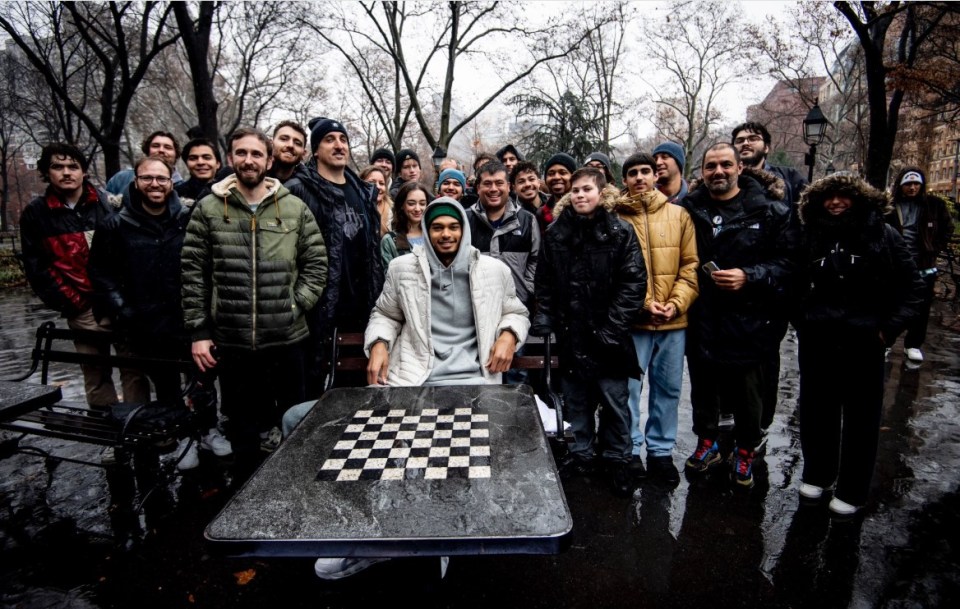 The NBA star posed with fans after the chess sess