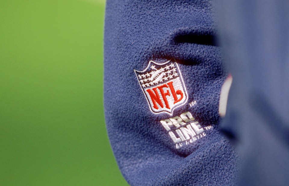 ORCHARD PARK, NY - OCTOBER 29:  A view of the National Football League shield logo appearing on a Pro Line jacket worn by a Buffalo Bills coach during a game against the New York Jets at Ralph Wilson Stadium on October 29, 2000 in Orchard Park, New York.  The Bills defeated the Jets 23-20.  (Photo by George Gojkovich/Getty Images)