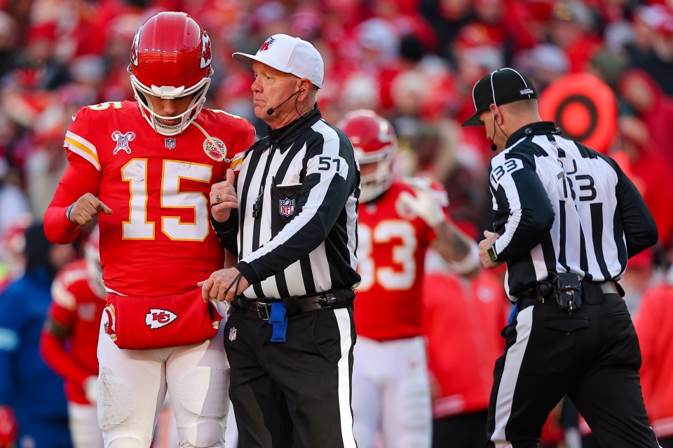 KANSAS CITY, MISSOURI - DECEMBER 21: Referee Carl Cheffers #51 speaks to Patrick Mahomes #15 of the Kansas City Chiefs during a break in the third quarter against the Houston Texans at GEHA Field at Arrowhead Stadium on December 21, 2024 in Kansas City, Missouri. (Photo by David Eulitt/Getty Images)
