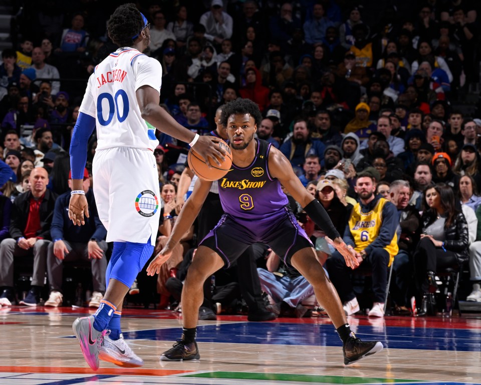 PHILADELPHIA, PA - JANUARY 28: Bronny James #9 of the Los Angeles Lakers plays defense during the game against the Philadelphia 76ers on January 28, 2025 at the Wells Fargo Center in Philadelphia, Pennsylvania NOTE TO USER: User expressly acknowledges and agrees that, by downloading and/or using this Photograph, user is consenting to the terms and conditions of the Getty Images License Agreement. Mandatory Copyright Notice: Copyright 2025 NBAE (Photo by David Dow/NBAE via Getty Images)