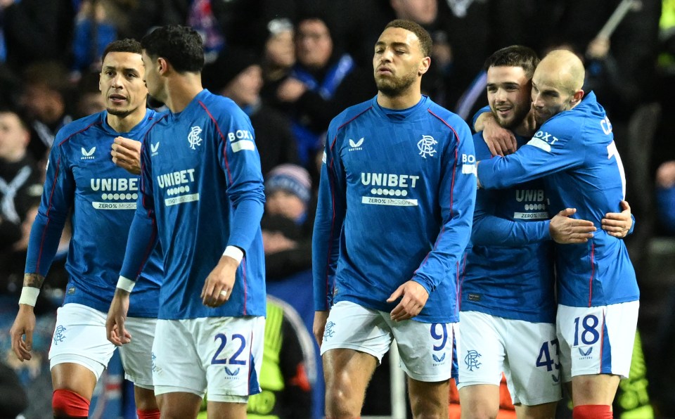 Rangers' Belgian midfielder #43 Nicolas Raskin (2R) celebrates scoring the opening goal during the UEFA Europa League football match between Rangers and Royale Union Saint-Gilloise at the Ibrox Stadium in Glasgow on January 30, 2025. (Photo by ANDY BUCHANAN / AFP) (Photo by ANDY BUCHANAN/AFP via Getty Images)