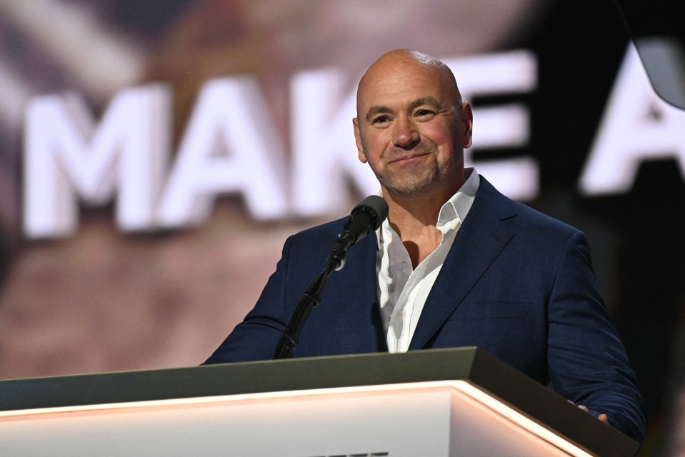 Dana White speaking at a podium.