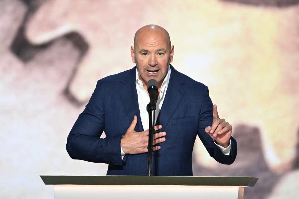 Dana White speaking at a podium.