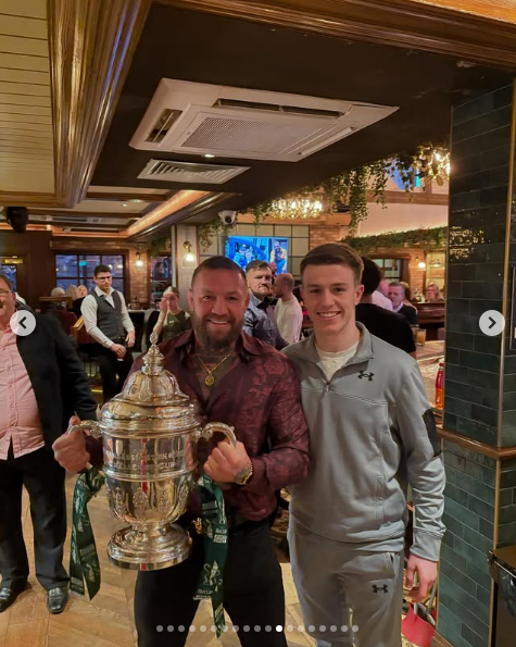 McGregor posed beside his cousin Warren Davis