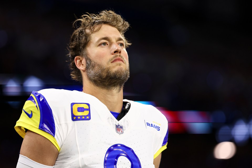 Matthew Stafford #9 of the Los Angeles Rams stands on the sidelines.